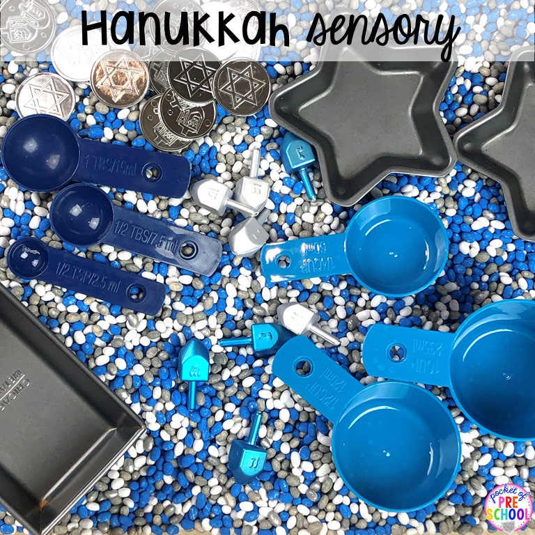 Hanukkah sesnory table plus more sensory tables for every holiday with various sensory fillers and sensory tools that incorperate math, literacy, and science into play. #sensorytable #sensorybin #sensoryplay #preschool #prek