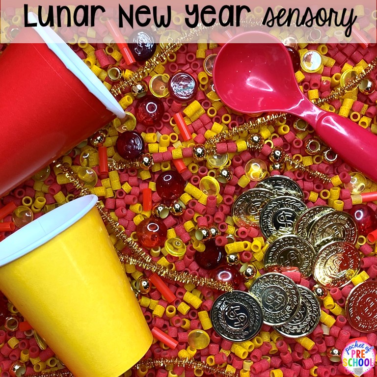Lunar New Year sensory table plus more holiday sensory tables for every holiday with various sensory fillers and sensory tools that incorperate math, literacy, and science into play. #sensorytable #sensorybin #sensoryplay #preschool #prek