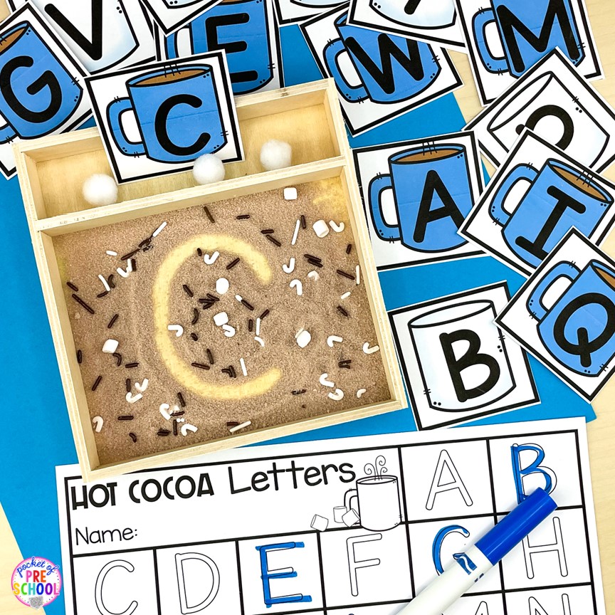 Hot cocoa letter writing sensory tray! A fun letter activity to learn letters and letter formation for preschool, pre-k, or kindergarten students. 